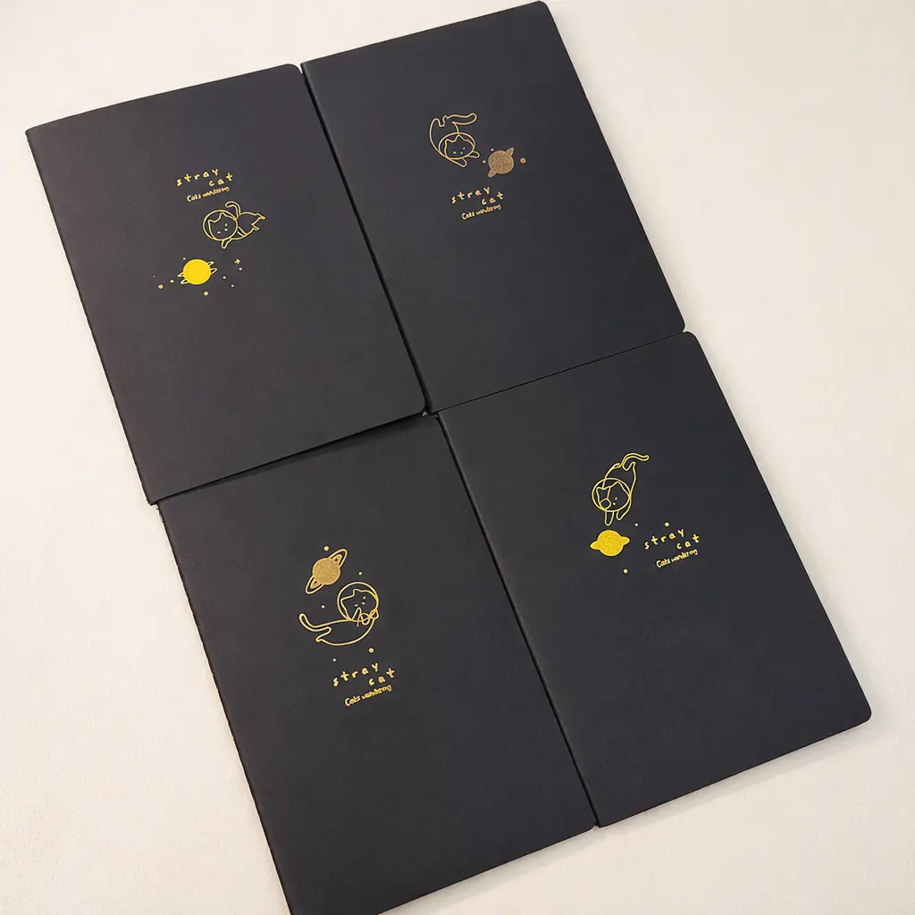 Libreta negra gato espacial